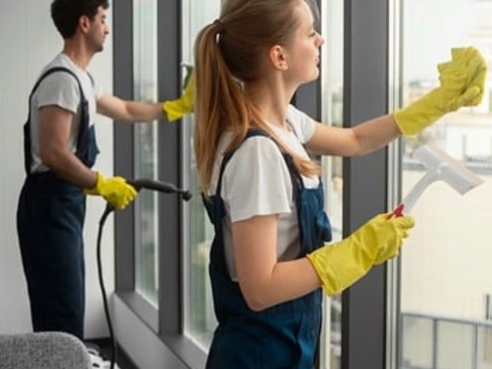 Centerpoint Cleaning team cleaning office windows